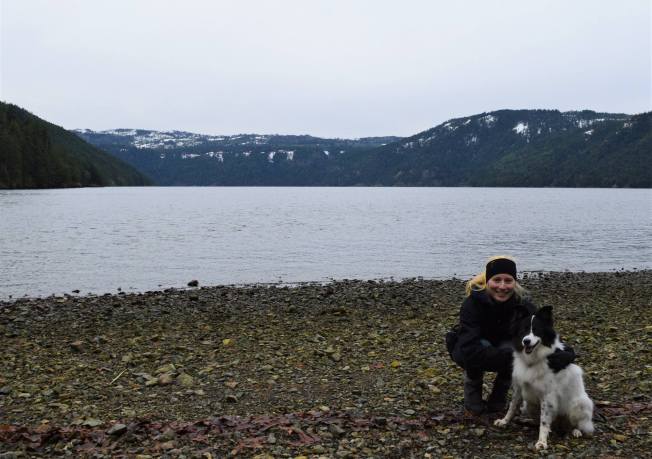 Ocean with snowy hills in the background